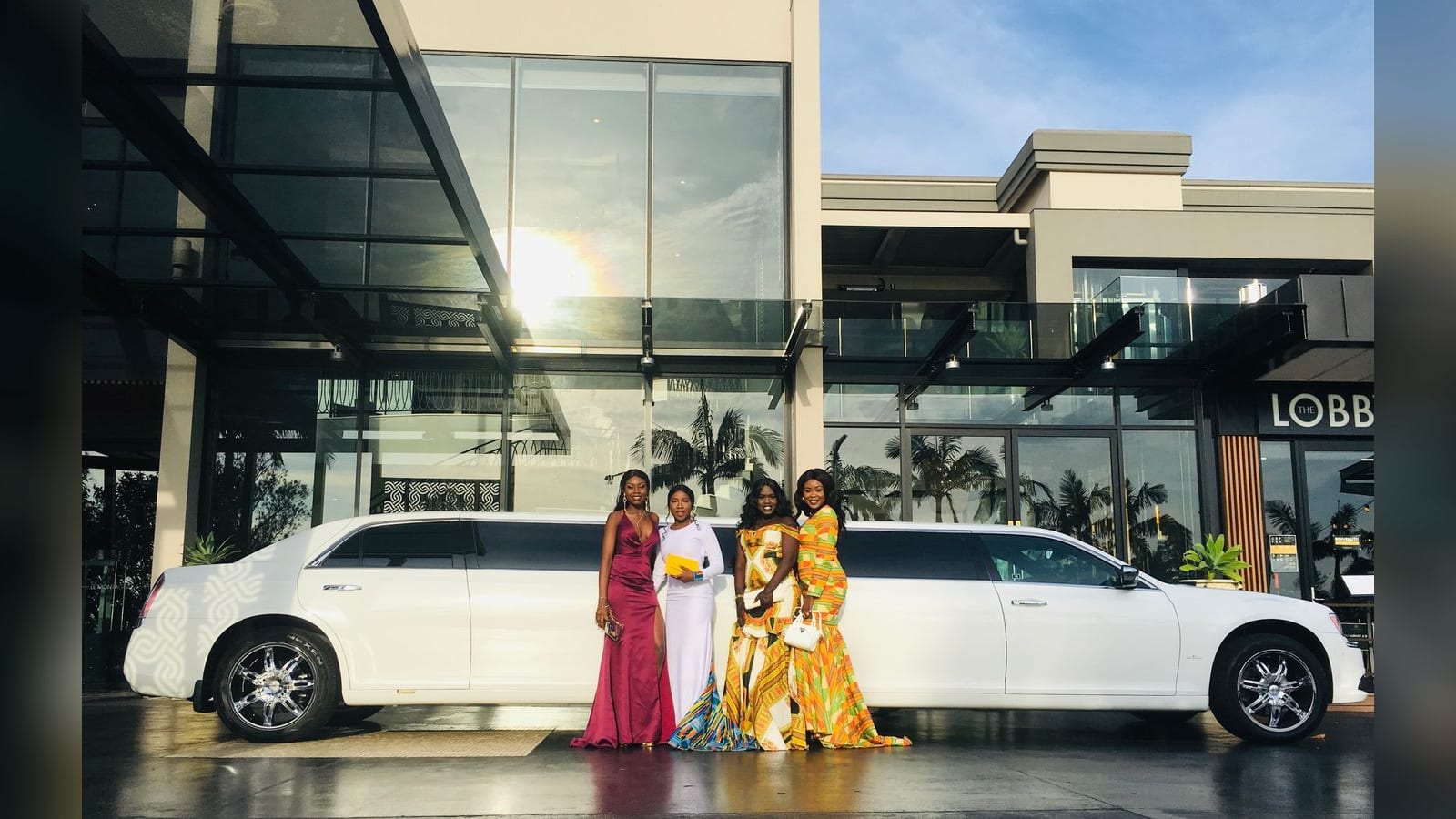 Chrysler Super Stretch Gullwing — with a bridal party outside a venue