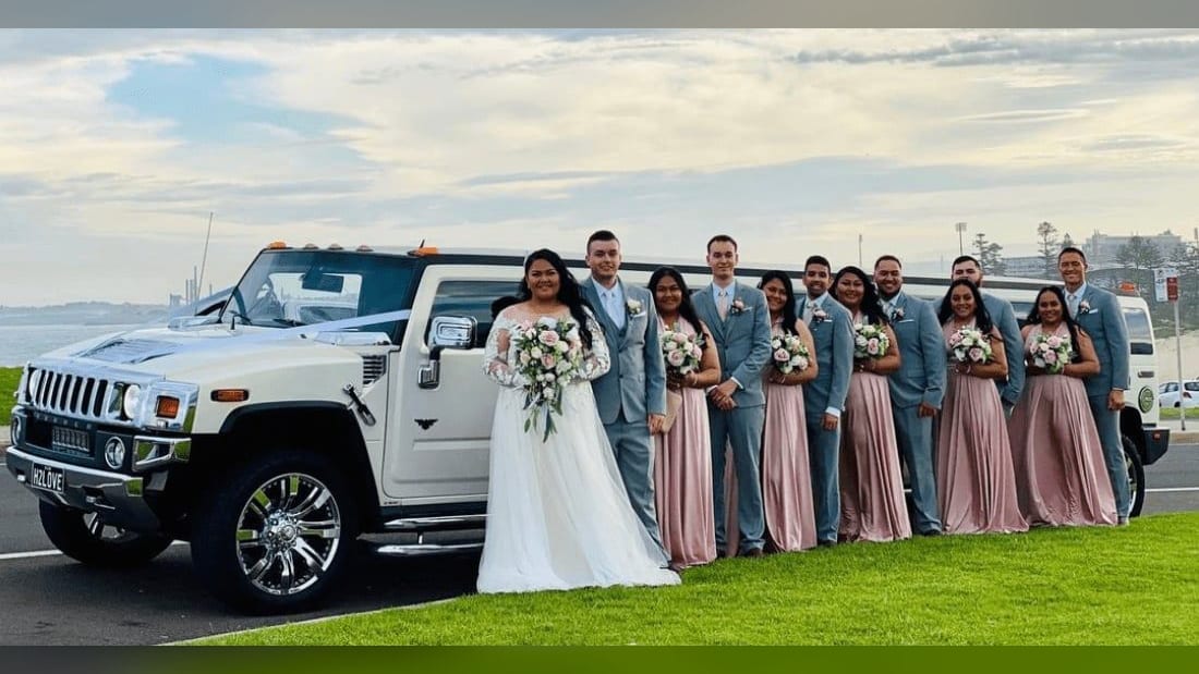 Stretch Hummer (14 Pax) — exterior, with the bridal party