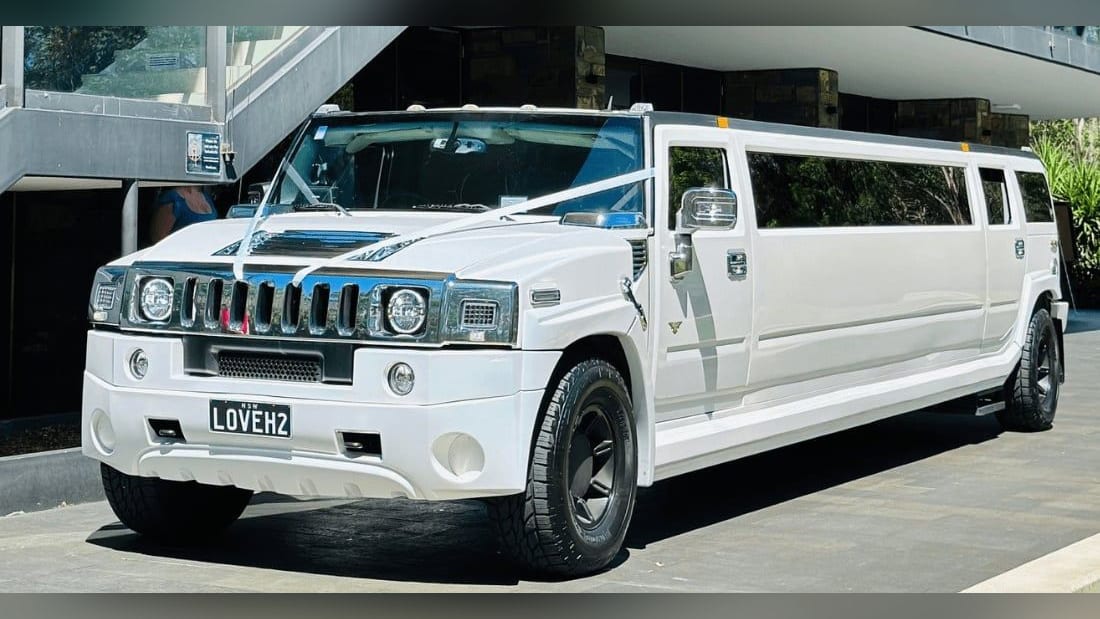 Stretch Hummer (16 Pax) — exterior, dressed with wedding ribbons