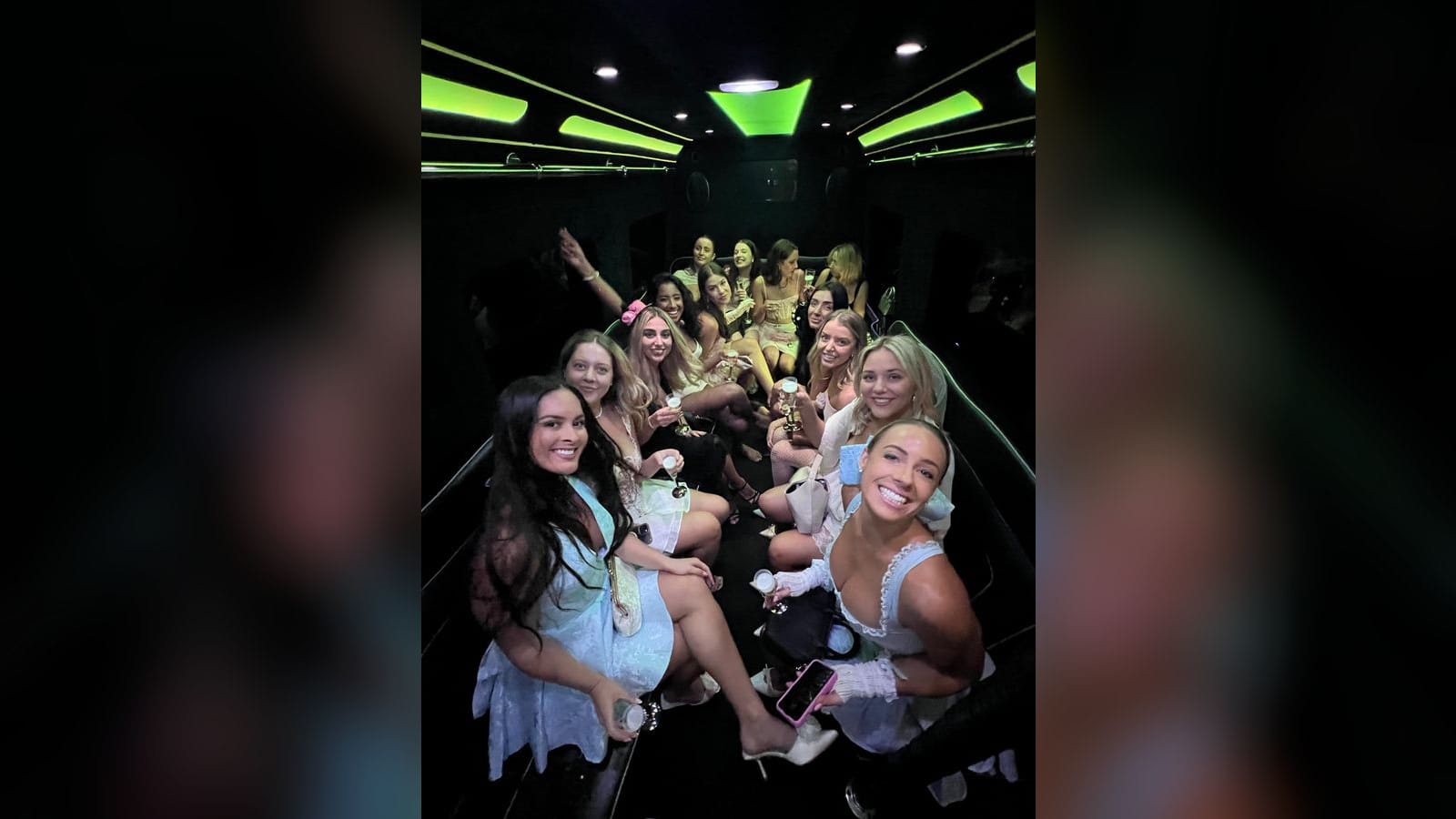 Mercedes Sprinter Limo Van — interior, hens party group with champagne in the cabin