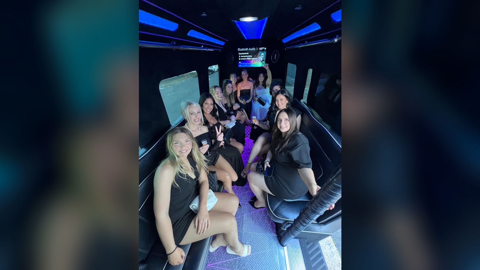 Mercedes Sprinter Limo Van — interior, party group celebrating in the LED lounge