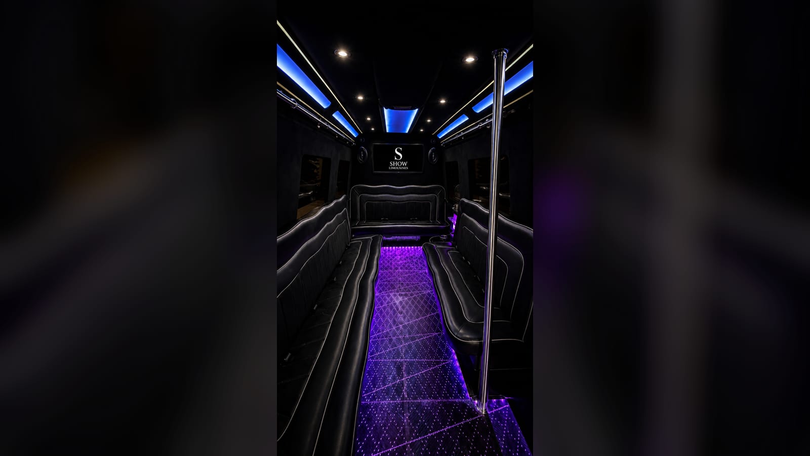 Mercedes Sprinter Limo Van — interior, lounge aisle with purple LED lighting