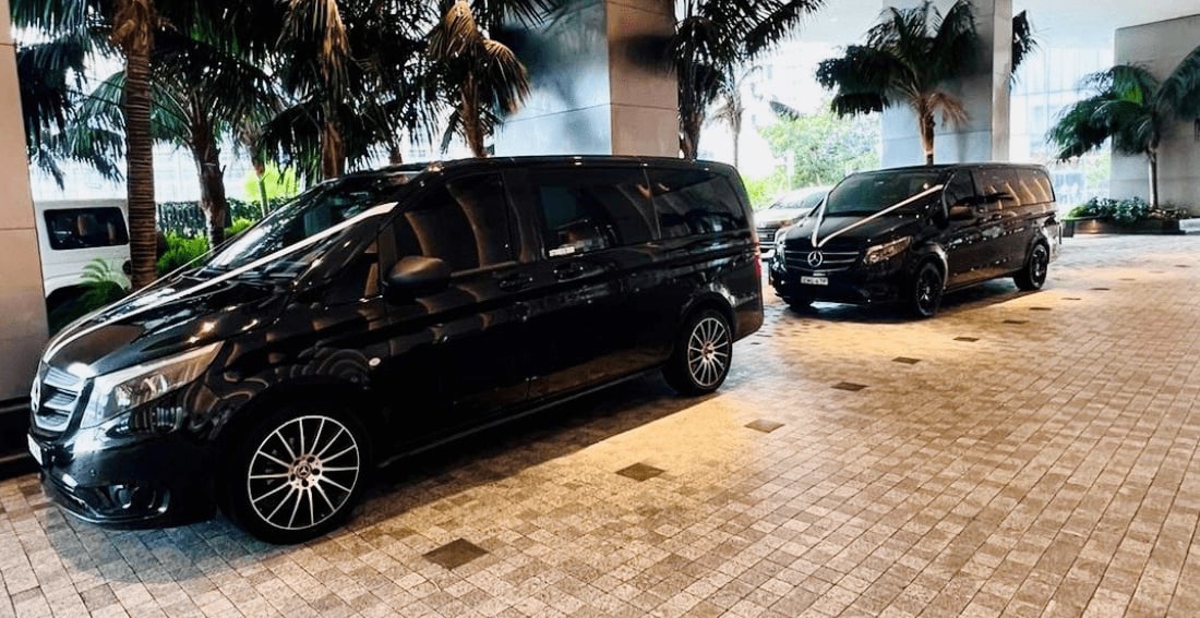Mercedes Valente Luxury Minivan — exterior, two Valente vans